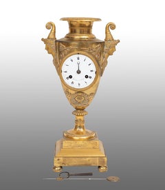 Finely chiseled gilt bronze French Empire antique clock. 