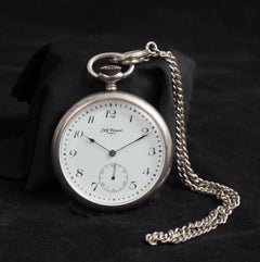 Antique silver pocket watch with original chain. France 20th Century.