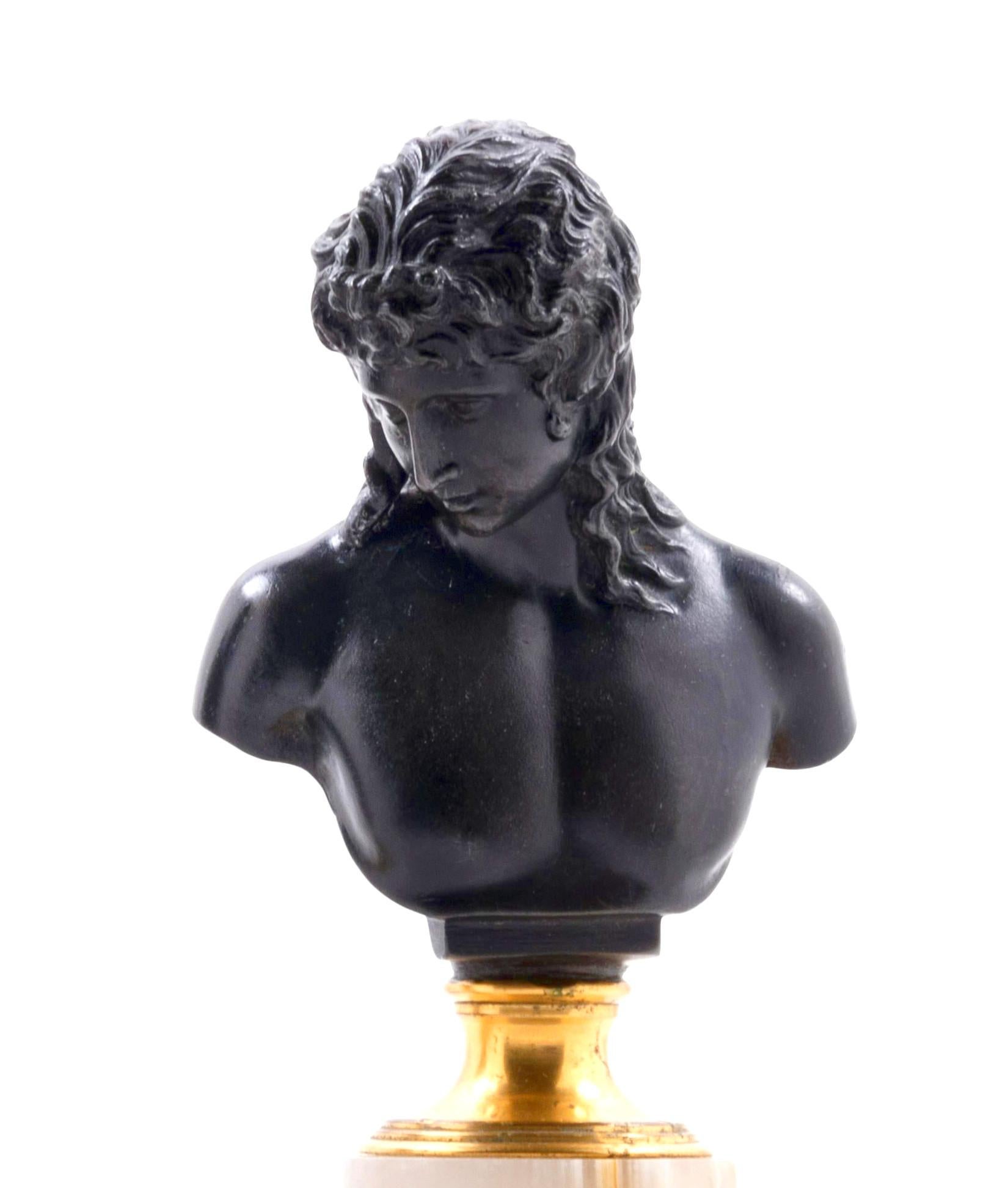 Pair of German Bronze and Onyx of Grand Tour Busts of Hermes and Ariadne

A wonderful pair of Grand Tour bronze busts of Ariadne based on the antique original in the Vatican Museum of Art in Rome and Hermes of Praxiteles the original being from the