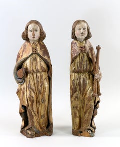 Pair of gilt and polychrome wood angels circa 1500