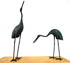 Pair of herons in chiseled bronze with green patina, 20th century (1960s)