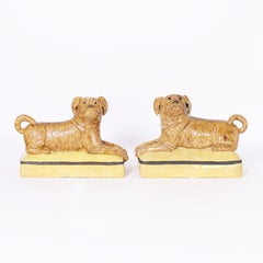 Pair of Italian Ceramic Recumbent Dog or Pug Sculptures