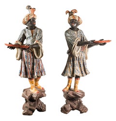 Pair of lacquered and painted wood blackamoor sculptures. Venice, 18th century