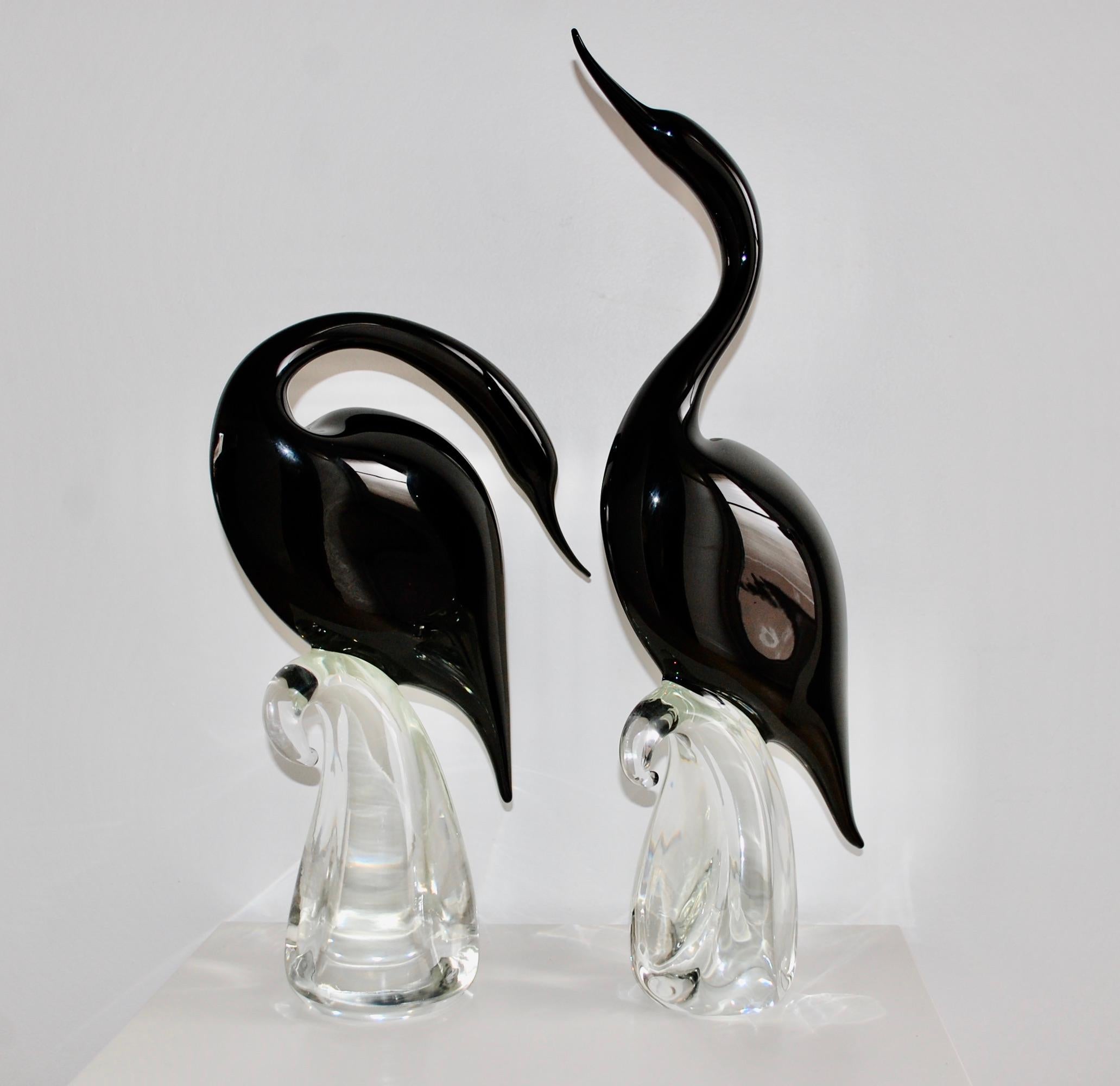 Pair of large and stunning black heron glass sculptures, original handmade in Venice Murano Italy.  