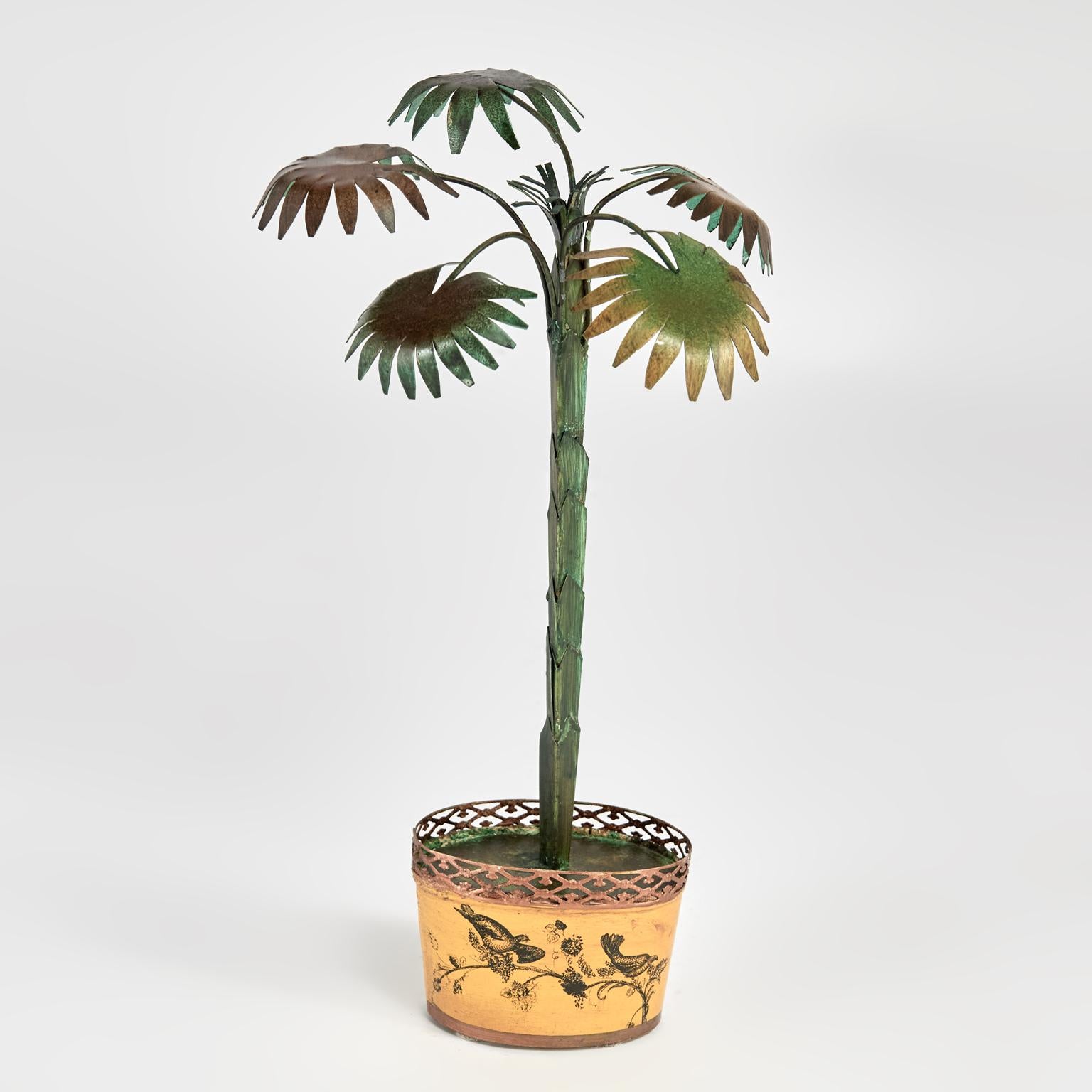 Charming pair of neoclassic Italian tole or painted palm trees with stylized fronds and trunks set in mustard color planters with galleries and decorated with birds and trees.

From left to right:

H: 14 W: 9 D: 9

H: 15 W: 8 D: 8