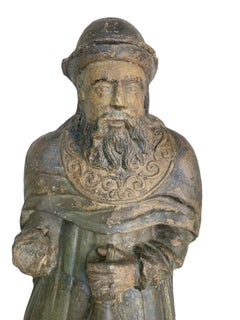 Pilgrim polychrome stone figure