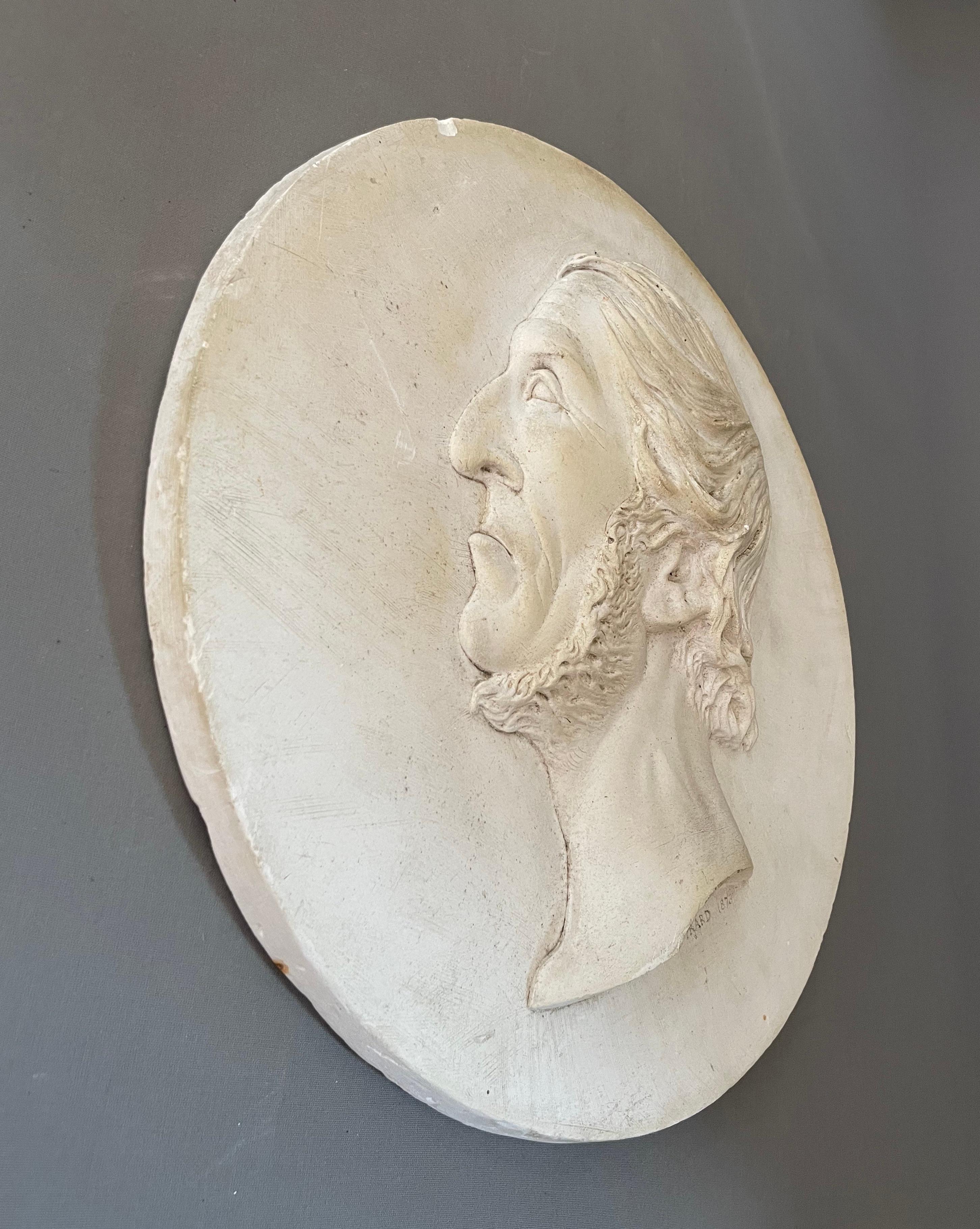 Plaster profile, medallion signed A. Girard 1873.  Small chips on the edges.  Diameter: 41 cm.