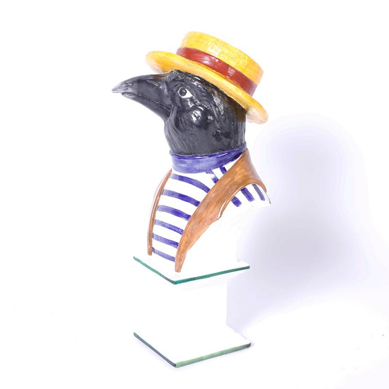 Whimsical Italian porcelain bust of a Crow or bird decked out in the Classic Venetian boatman's striped shirt and straw hat. Signed on the bottom Italy Royal Majolyca.
