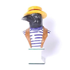 Buste en porcelaine d'un gondolier avec oiseau