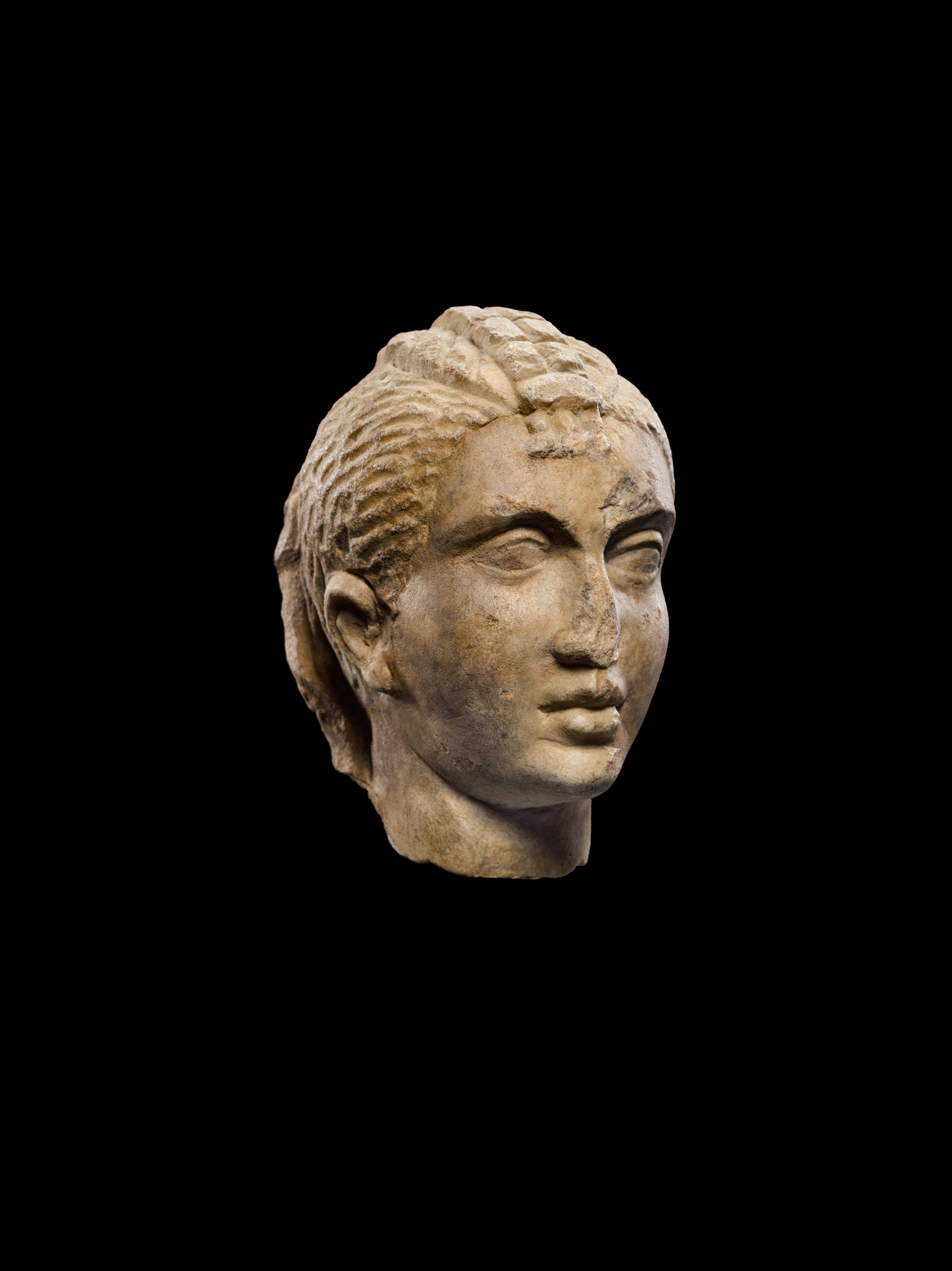 PORTRAIT HEAD OF A GIRL

Rome, circa 2nd/3rd century A.D.
Marble
height 18.4 cm
height 7 1/4 in

Provenance:
Sotheby's, London, May 23rd, 1988, no. 240, illus. 
Royal-Athena Galleries, New York, by 1988
François Antonovich, Paris, by 1996