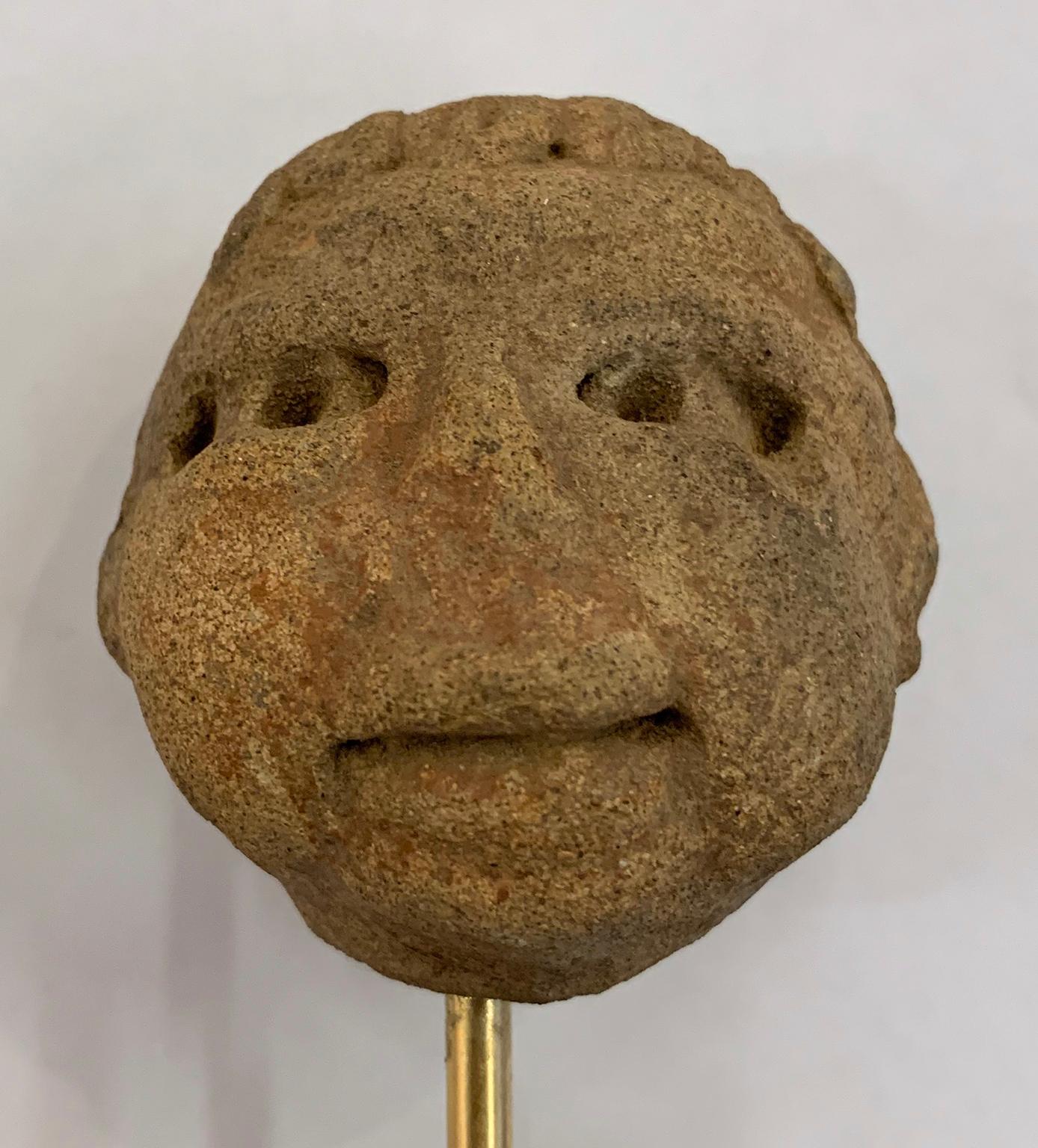 Pre Columbian Mesoamerica clay head, Veracruz Culture Approximatly 600 - 900 BCE.Variations of these figures are well represented within the antiquity collections of major institutions throughout Europe and the Americas.

The archaeological dating