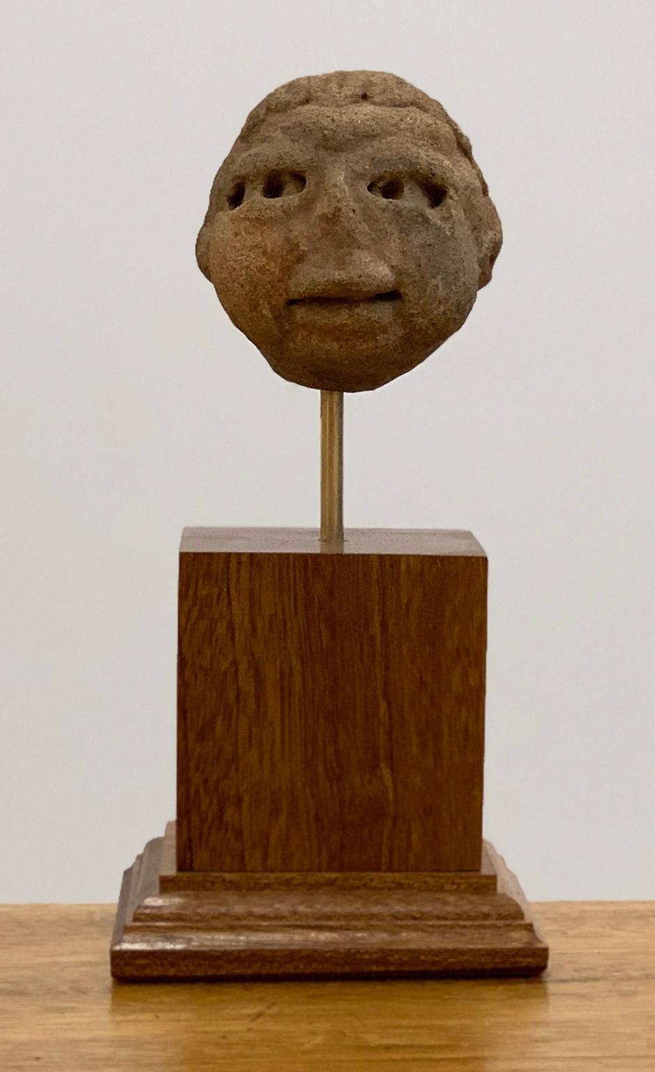 Unknown Figurative Sculpture - Pre Columbian Mesoamerica clay head, Veracruz Culture Approximatly 600 - 900 BCE