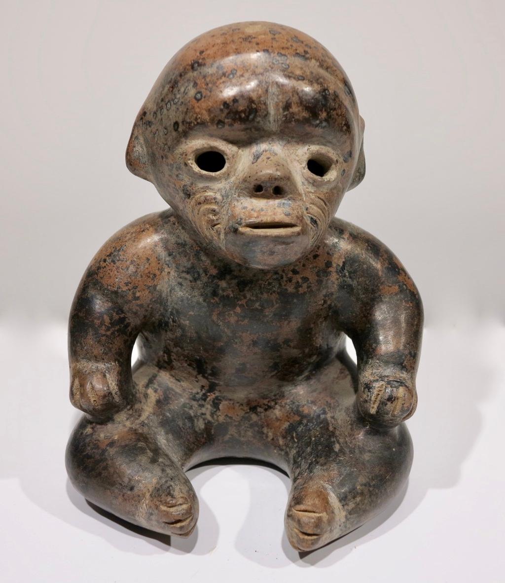 Pre-Columbian, Western Mexico, Colima Seated Dwarf figural redware sculpture  - Sculpture by Unknown