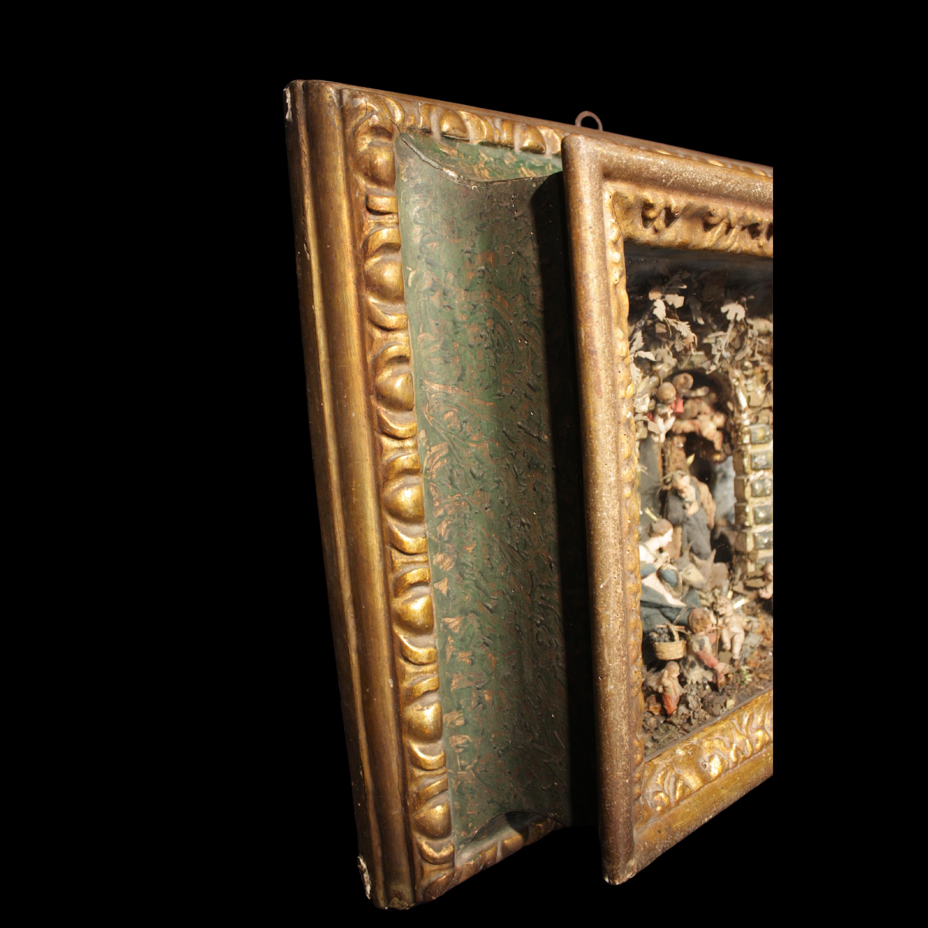 16th century Neapolitan nativity scene in gilded and marbled frame - Baroque Sculpture by Unknown