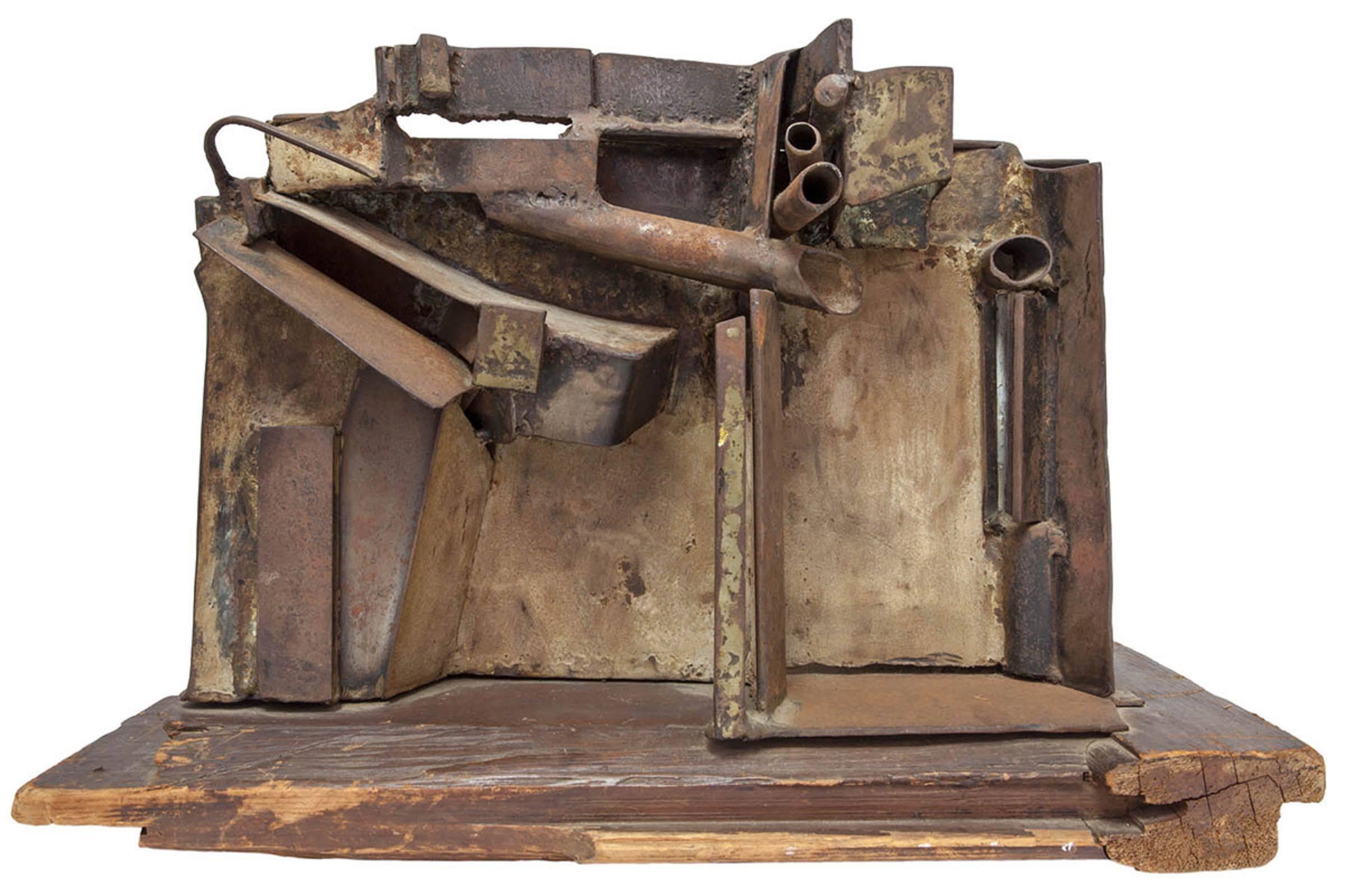  Large Abstract Expressionist Welded Assemblage Sculpture. it appears unsigned. it is on a found wood original base. it has a Brutalist quality to it. It commands a lot of presence