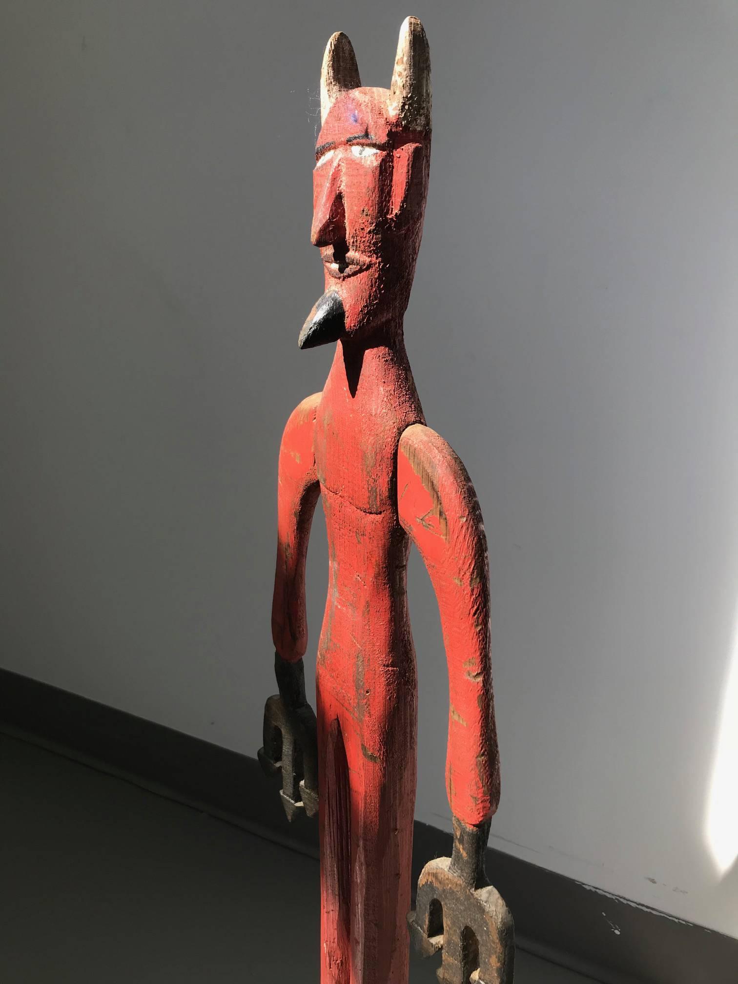 Red Devil - Brown Figurative Sculpture by Unknown