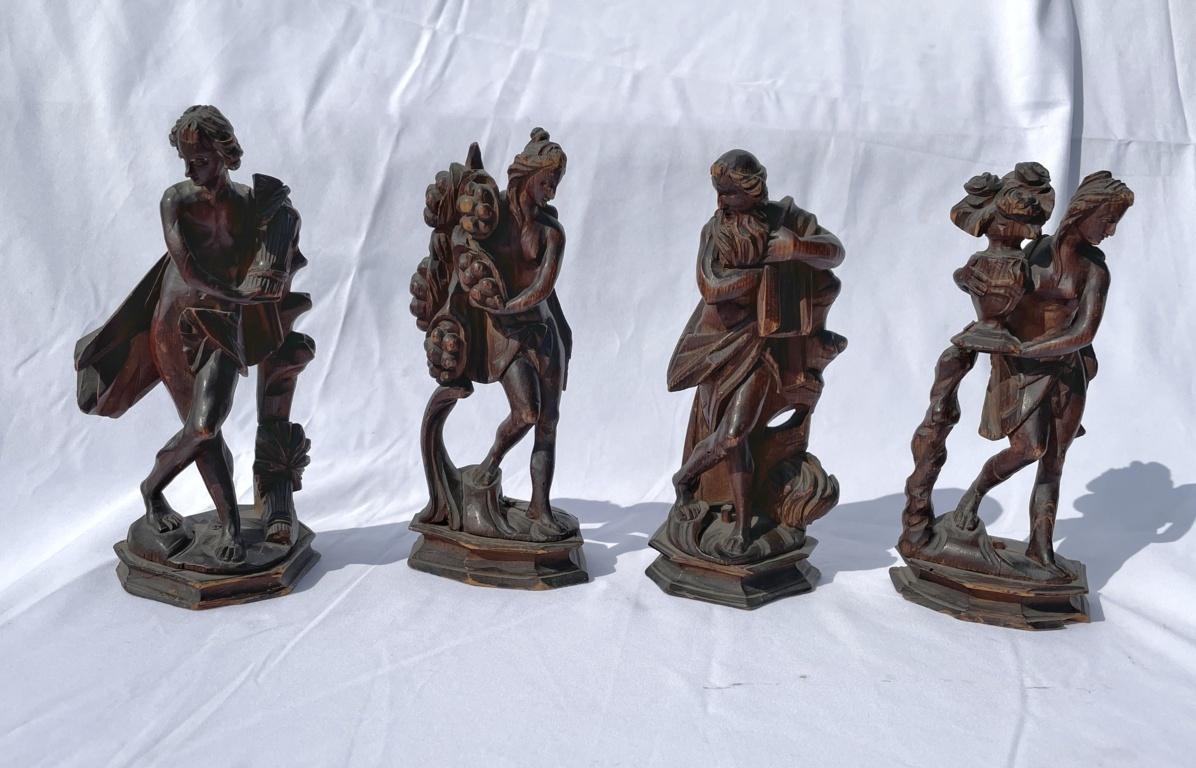 Rococò Venice - Set of four 18th century carved wood sculptures - Seasons - Sculpture by Unknown