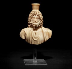 ANCIENT ROMAN ALABASTER BUST OF THE GOD SERAPIS, ROME CIRCA 1ST-2ND CENTURY A.D.