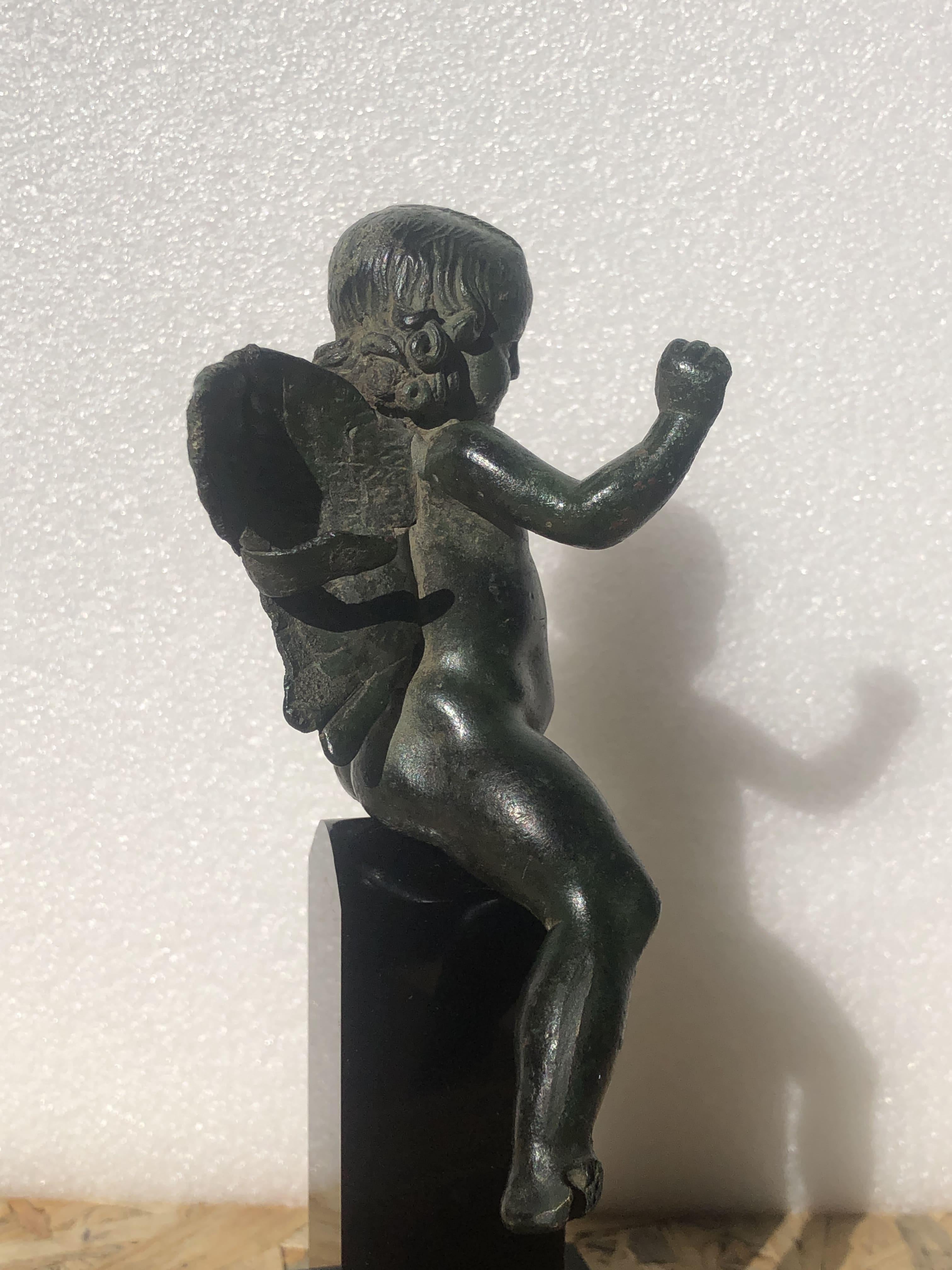 ANCIENT ROMAN BRONZE FIGURE OF WINGED EROS RIDING A DOLPHIN, 2ND CENTURY AD For Sale 2