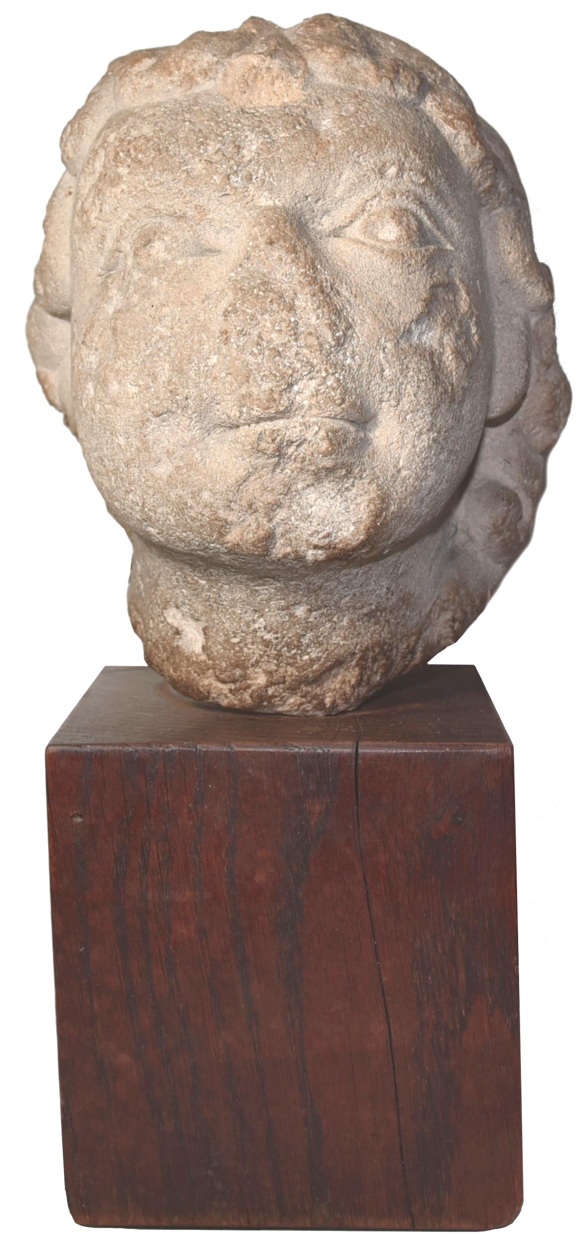 Unknown Figurative Sculpture - Romanesque head of Jesus child circa 1150