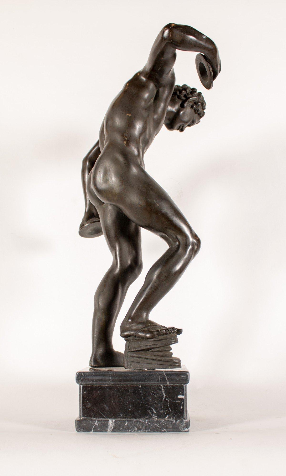 19TH CENTURY CONTINENTAL SCHOOL
Satyr with Cymbals and Kroupezion, Grand Tour after the Antique
Bronze with marble base
26 in. h. x 15 in. w. x 10 in. d.

This dancing faun is now more precisely identified as a satyr. Satyrs are roguish figures from