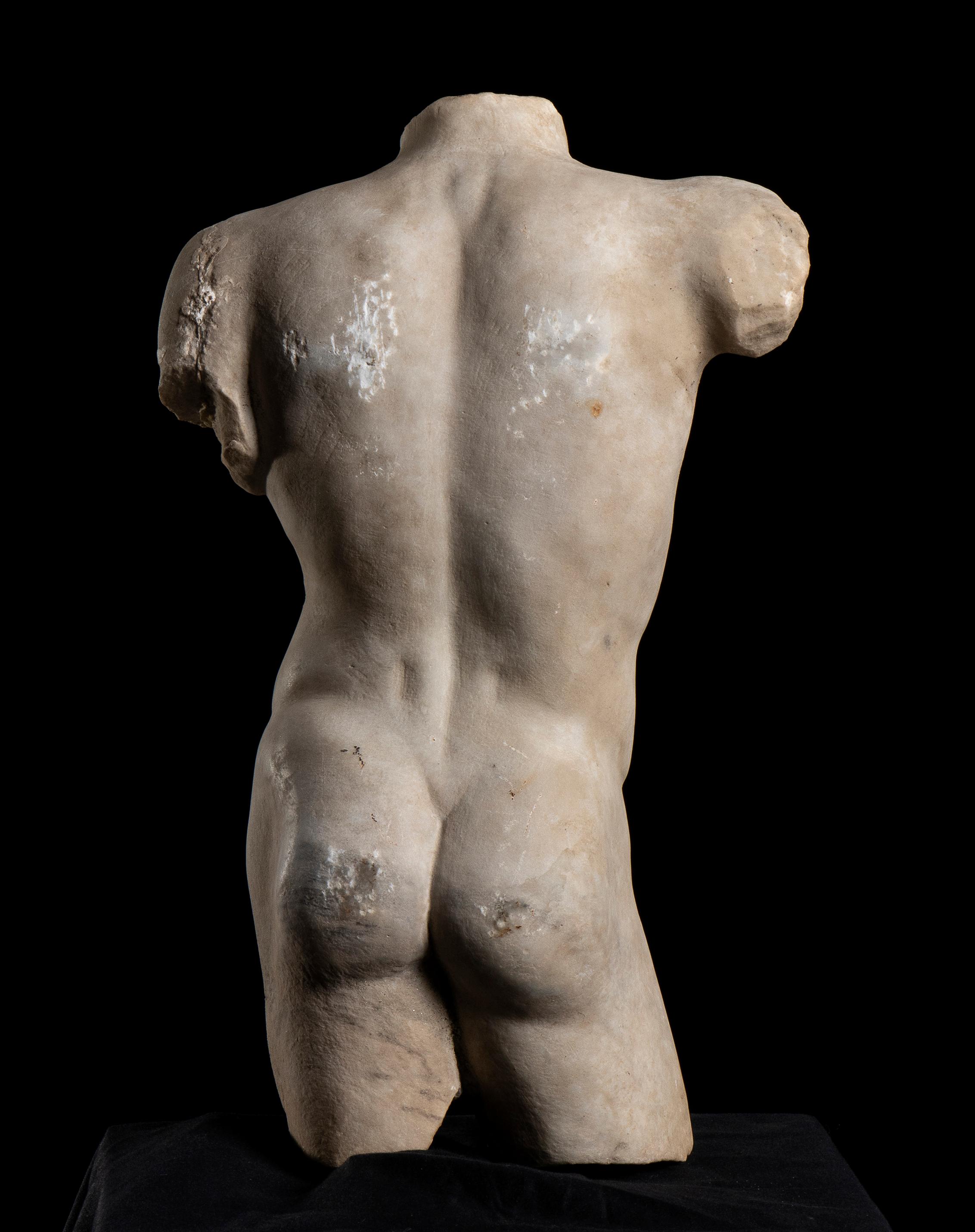 an impressive and superlative torso sculpture of Doryphoros after the original made by Polykleitos or Policletus carved in white statuary marble and representing the perfection of the classical. Polykleitos was an ancient Greek sculptor  of the 5th