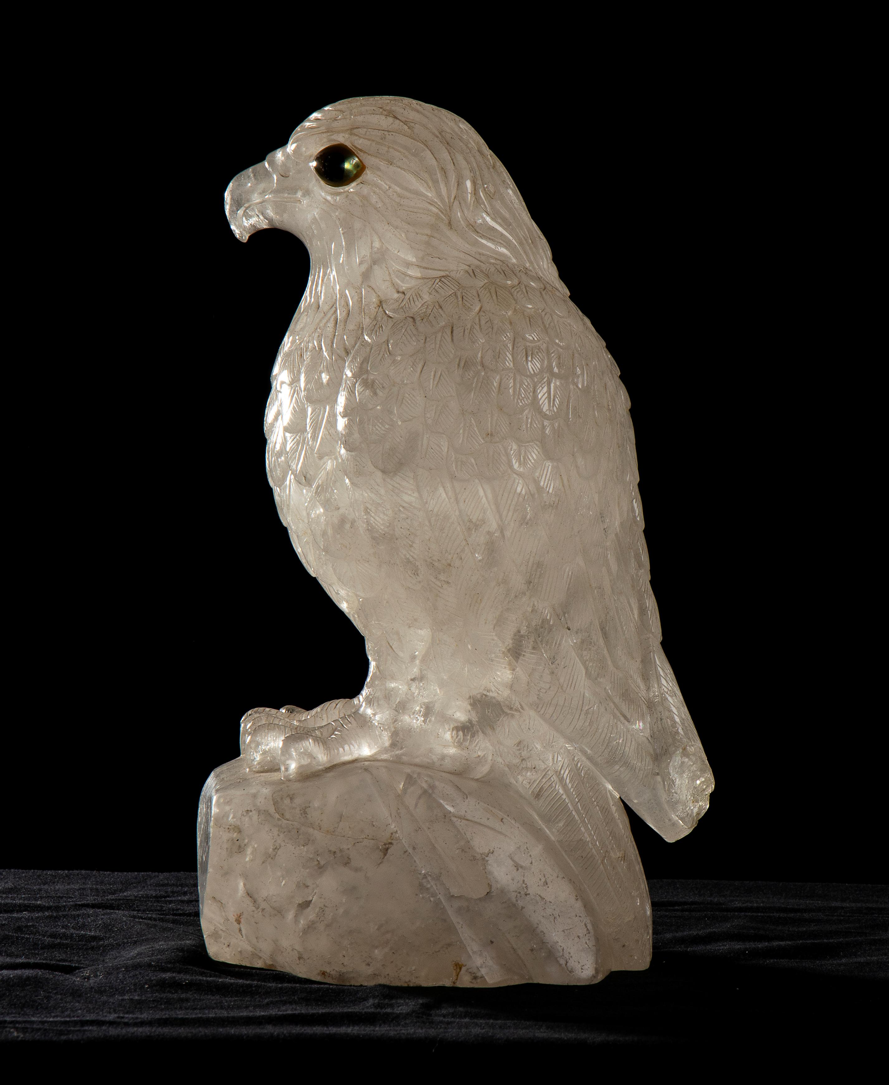 An impressive and unique sculpture of Eagle carved by a rare block of the beautiful Rock Crystal, called also Quartz or white Quartz. This stone is so much beautiful and precious that is used in the most expensive and luxury artworks and decorative