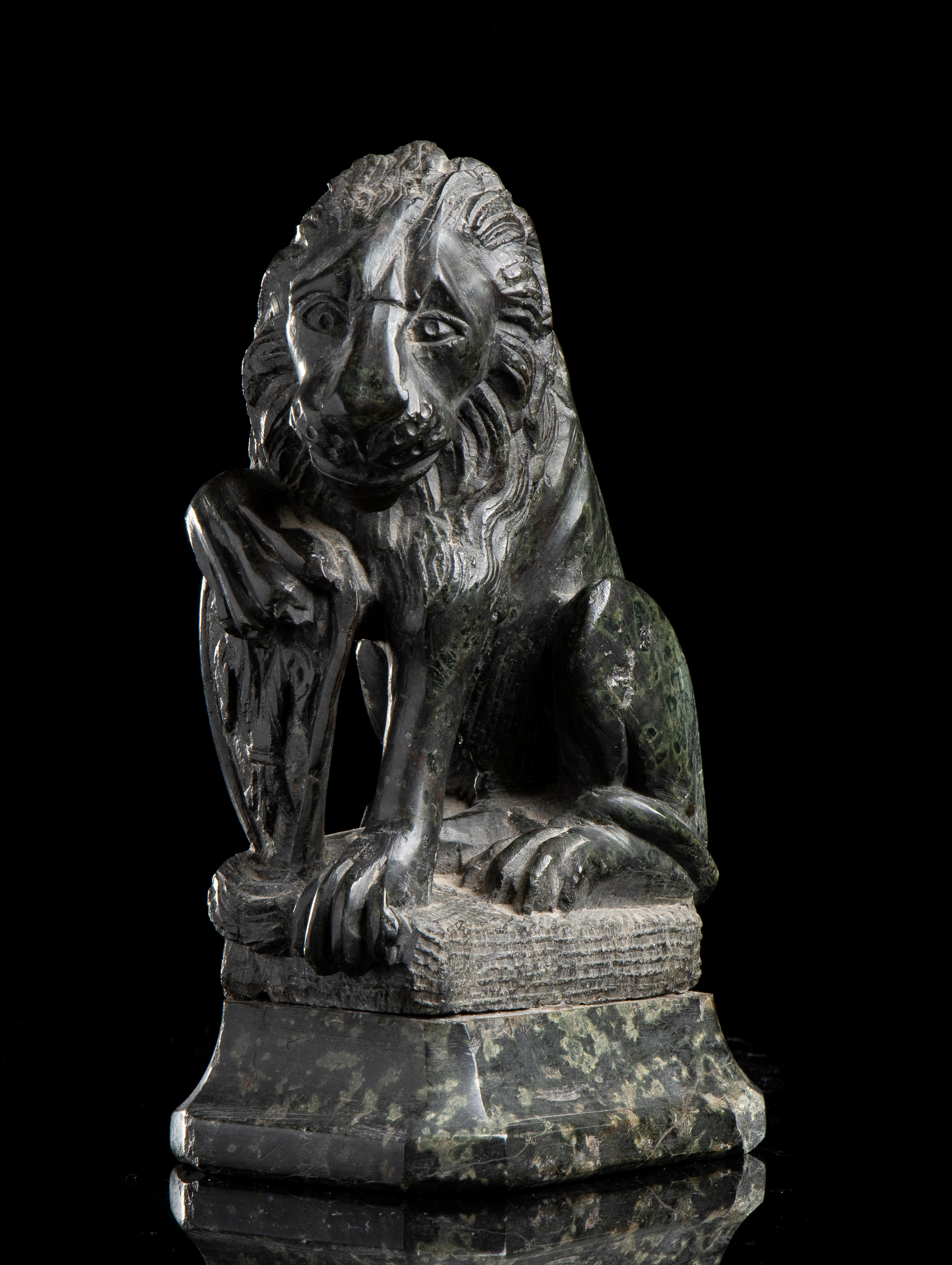 Carved in the green marble know as verde prato, by a Florentine sculptor of the XX century this grand tour version of the Leone "Marzocco" is an exquisite example of elegance and heritage.
The Marzocco is the heraldic lion symbol of Florence and was