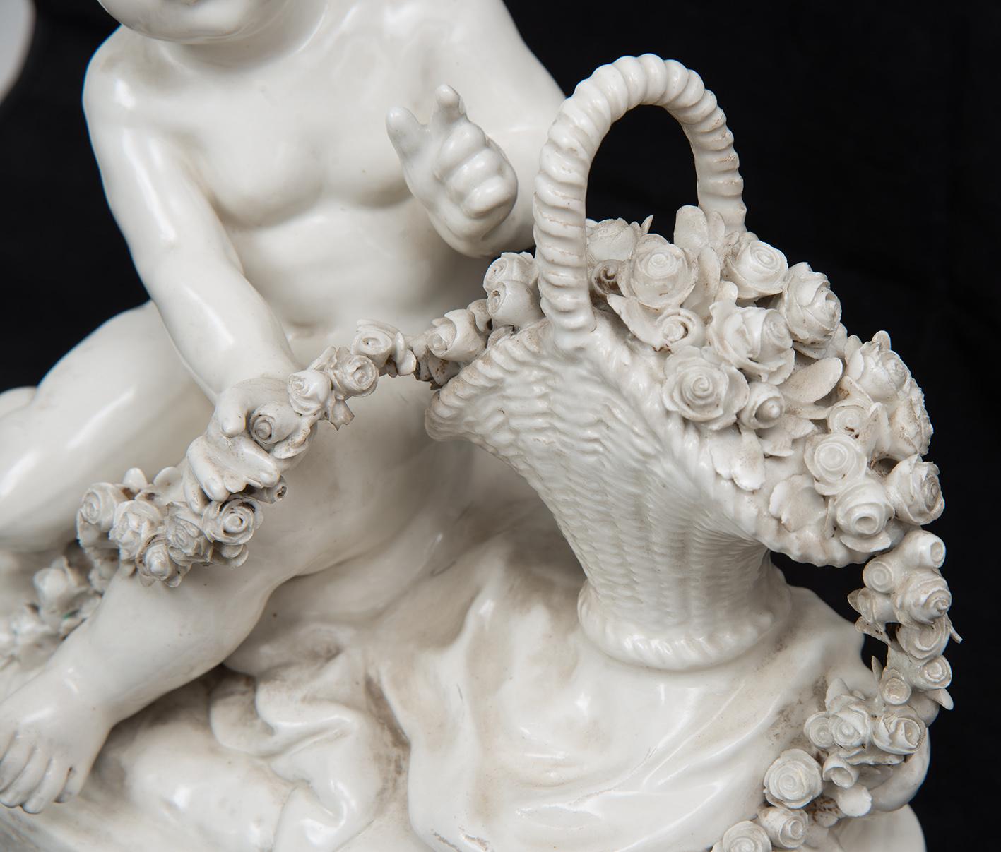 Capodimonte porcelain sculptural group belonging to the early 20th century.

The group depicts a putto in a romantic attitude while holding a wreath.

The fineness of the carving and composition of the work places it between the first and second