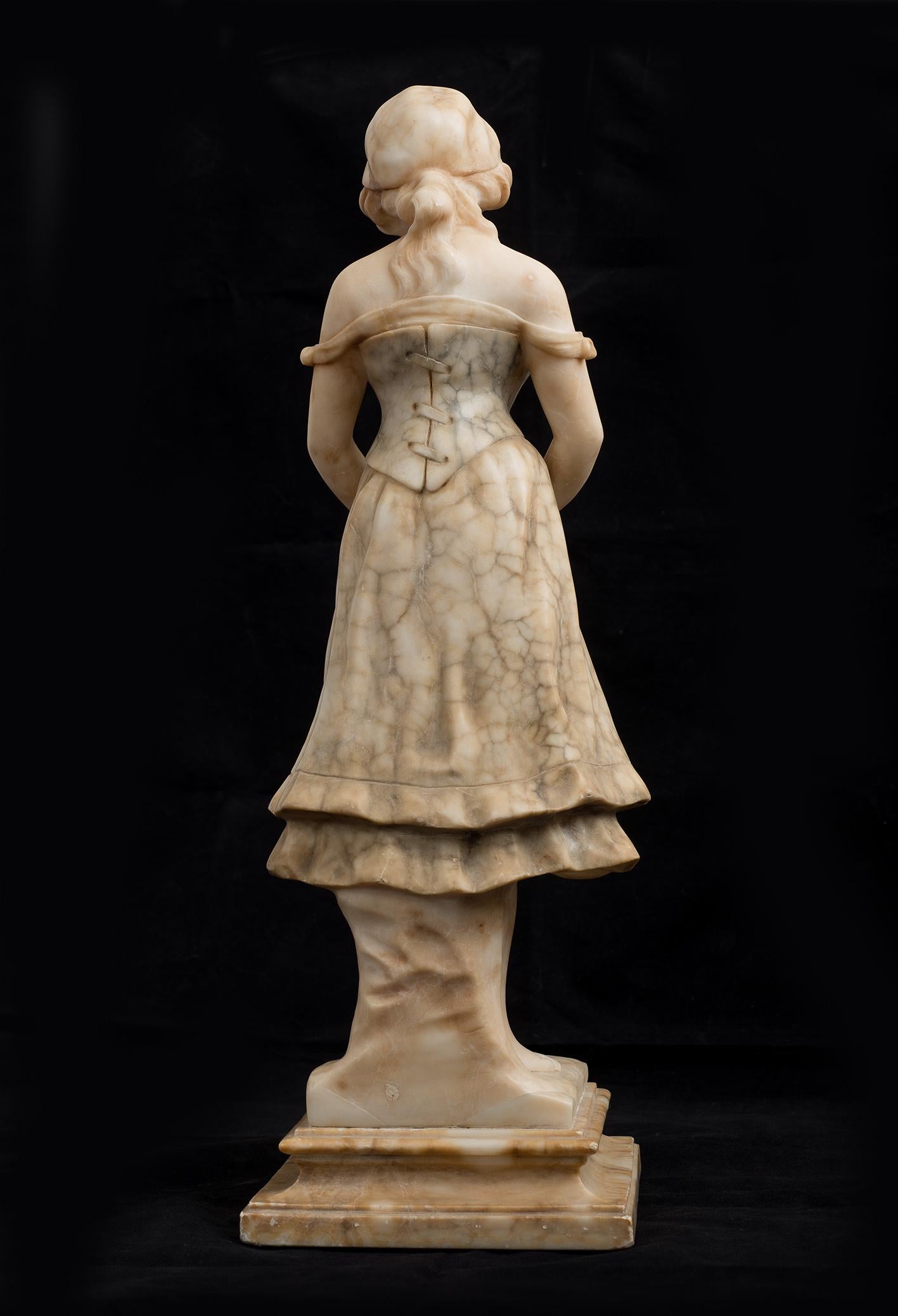 Antique alabaster sculpture French Napoleon III belonging to the second half of the 19th century.

The woman is depicted in period clothing and hat while holding a bouquet of flowers.

Condition: Very good Condition.

Provenance: 19th-century