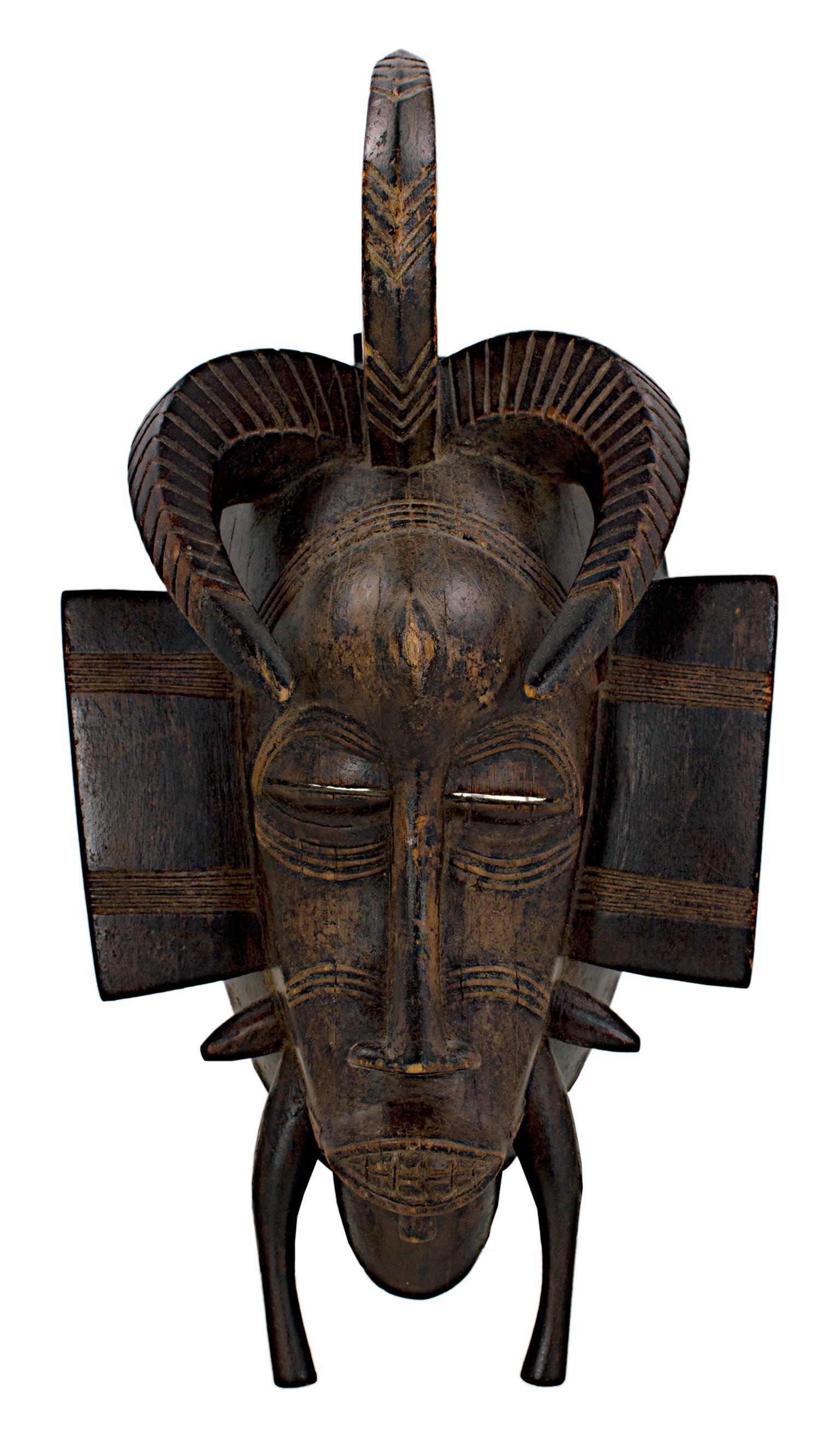 Unknown Figurative Sculpture - "Senufo Dance Mask - Ivory Coast, " Wood Carved Mask created circa 1940