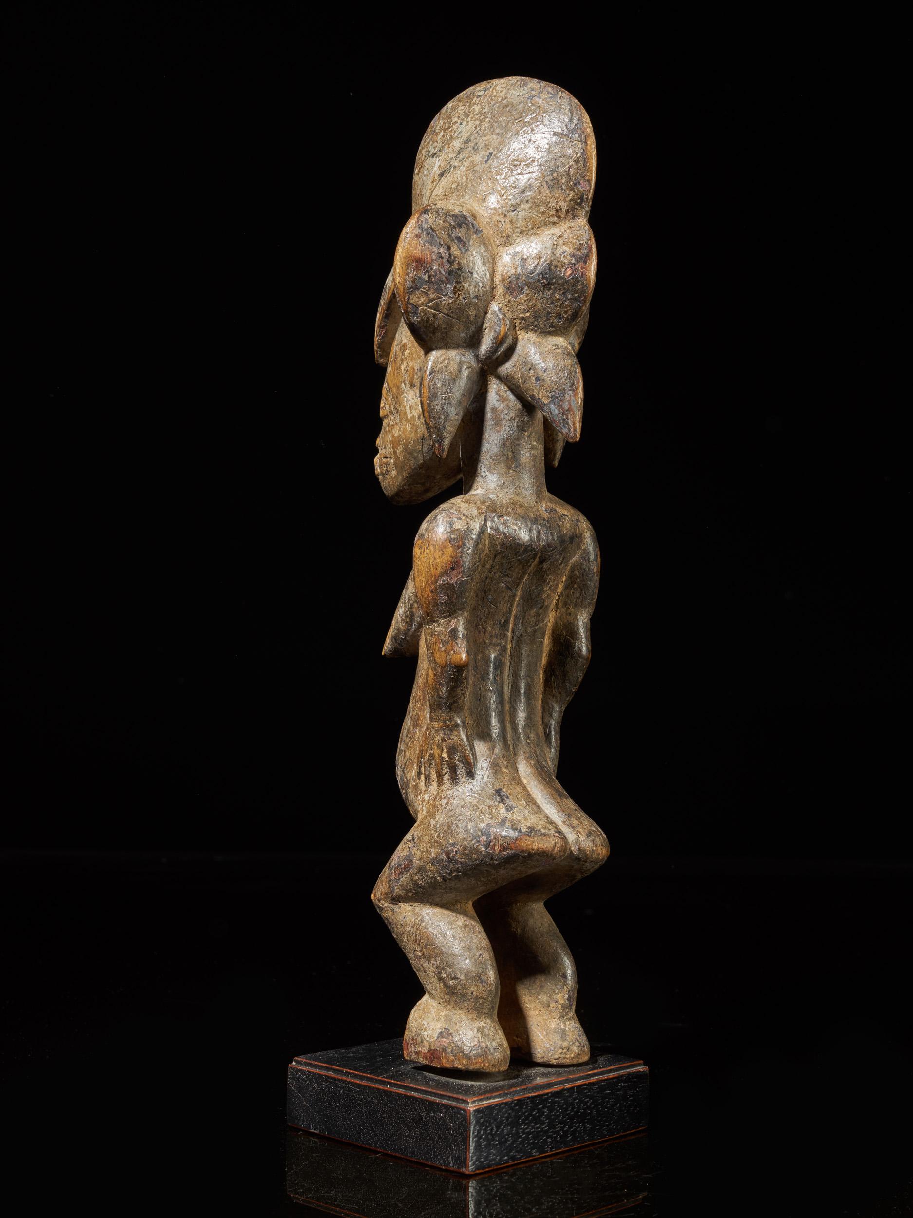 Senufo People, Ivory Coast, Standing Female Tugubele Divination Figure. 1