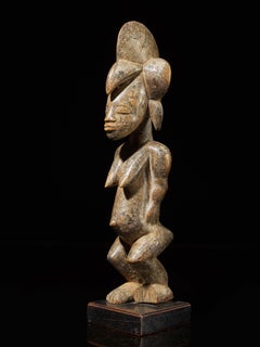 Senufo People, Ivory Coast, Standing Female Tugubele Divination Figure.