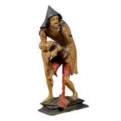 Set of Three 18th century Venetian carved lacquered wood figures beggar