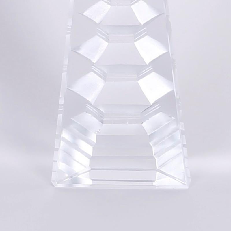 Here are three cut crystal obelisks with the unexpected pagodas appearing inside. By cutting stylized geometrics into the back the results in the fronts are truly magic.