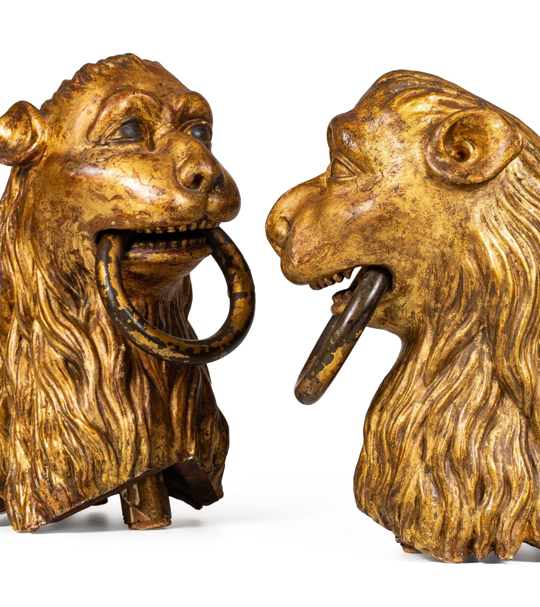 SET OF TWO ITALIAN CARVED AND GILT WOODEN HEADS OF LIONS - Brown Figurative Sculpture by Unknown