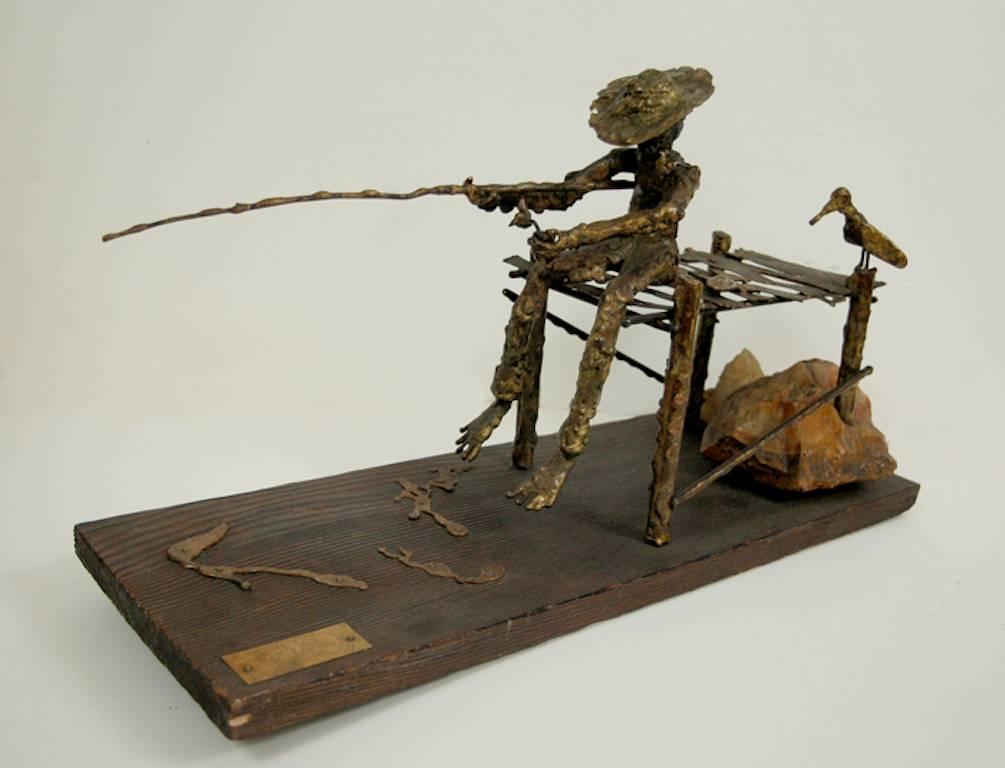 signed illegibly; Fisherman and Bird; bronze, wood, rock - Sculpture by Unknown