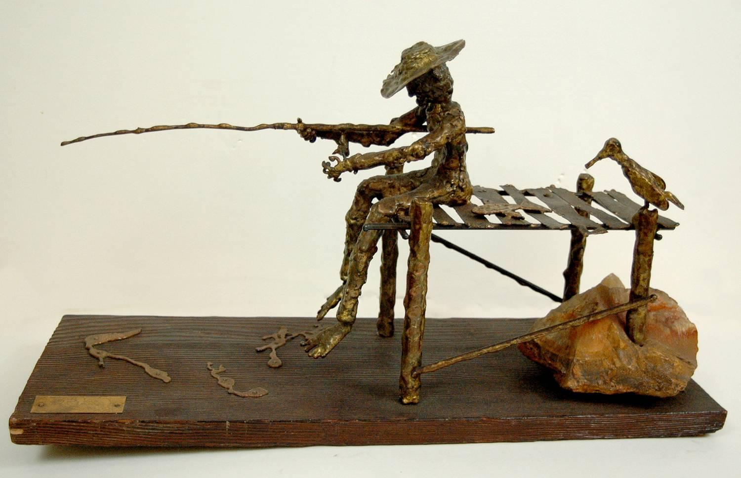 Unknown Figurative Sculpture - signed illegibly; Fisherman and Bird; bronze, wood, rock