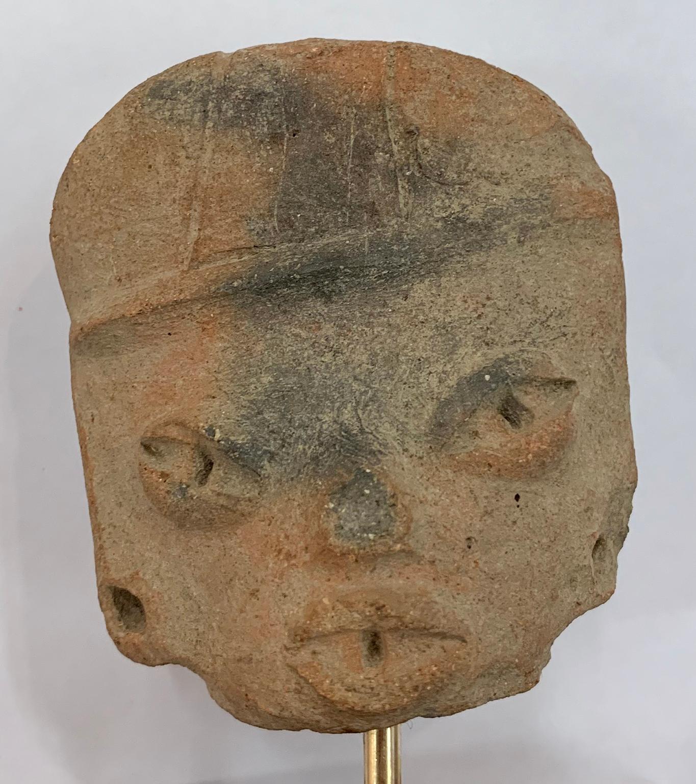 Small head of a flat figure with headdress - Michoacán - West Mexico. - Tribal Sculpture by Unknown
