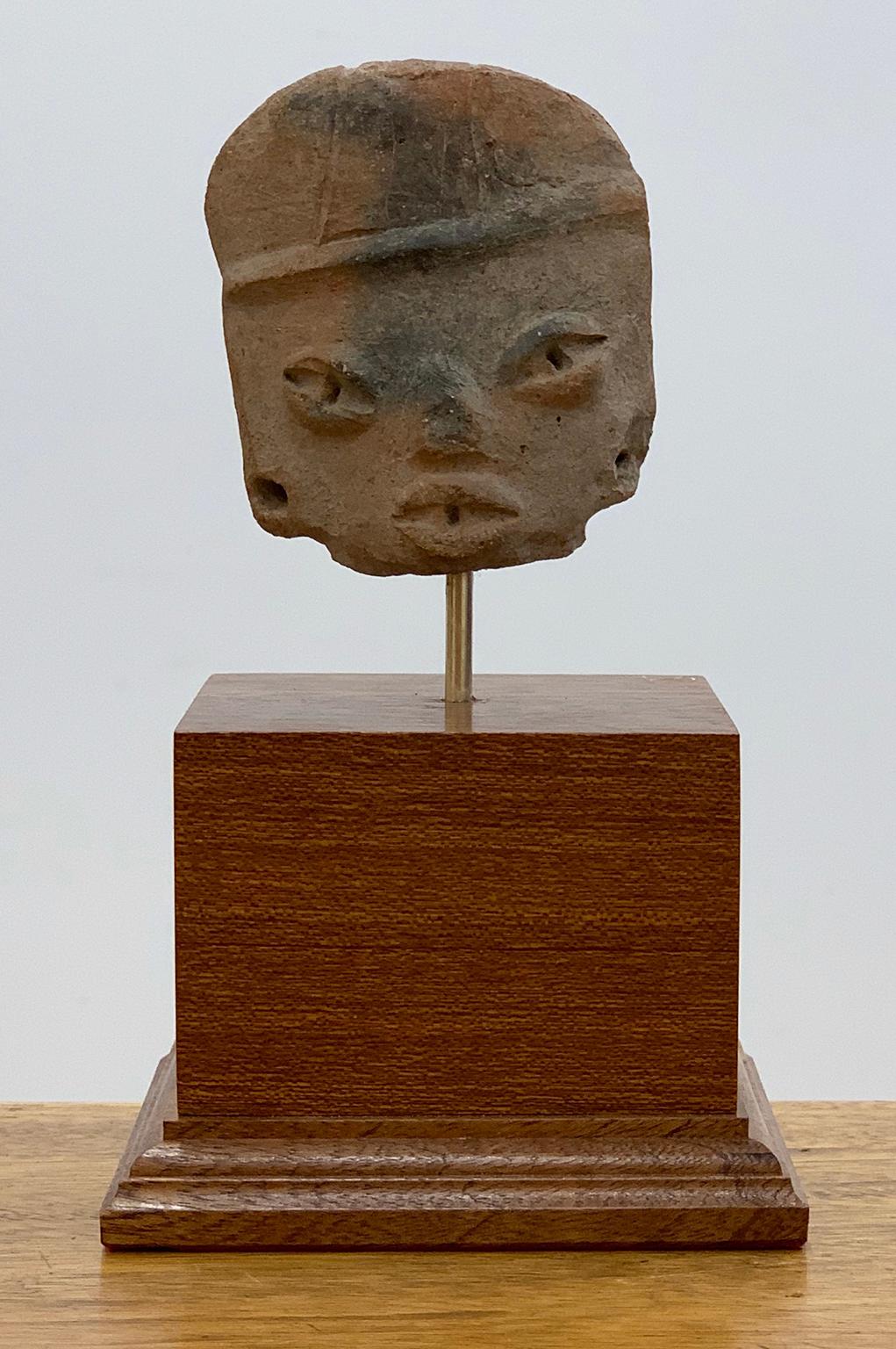 Unknown Figurative Sculpture - Small head of a flat figure with headdress - Michoacán - West Mexico.