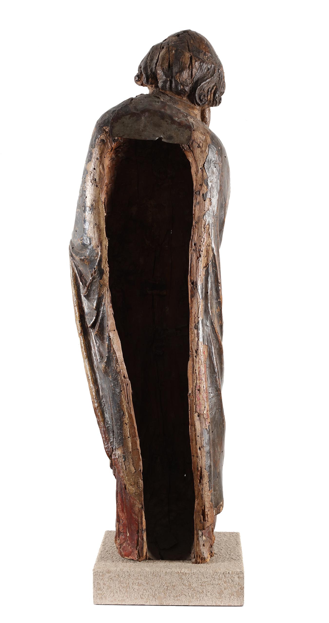 Sculpted in wood, original polychromy

 
A wooden sculpture from the 15th century, portraying St. John the Evangelist. The sculpture captures St. John with a sense of serene majesty. His visage is marked with a combination of devotion and wisdom.