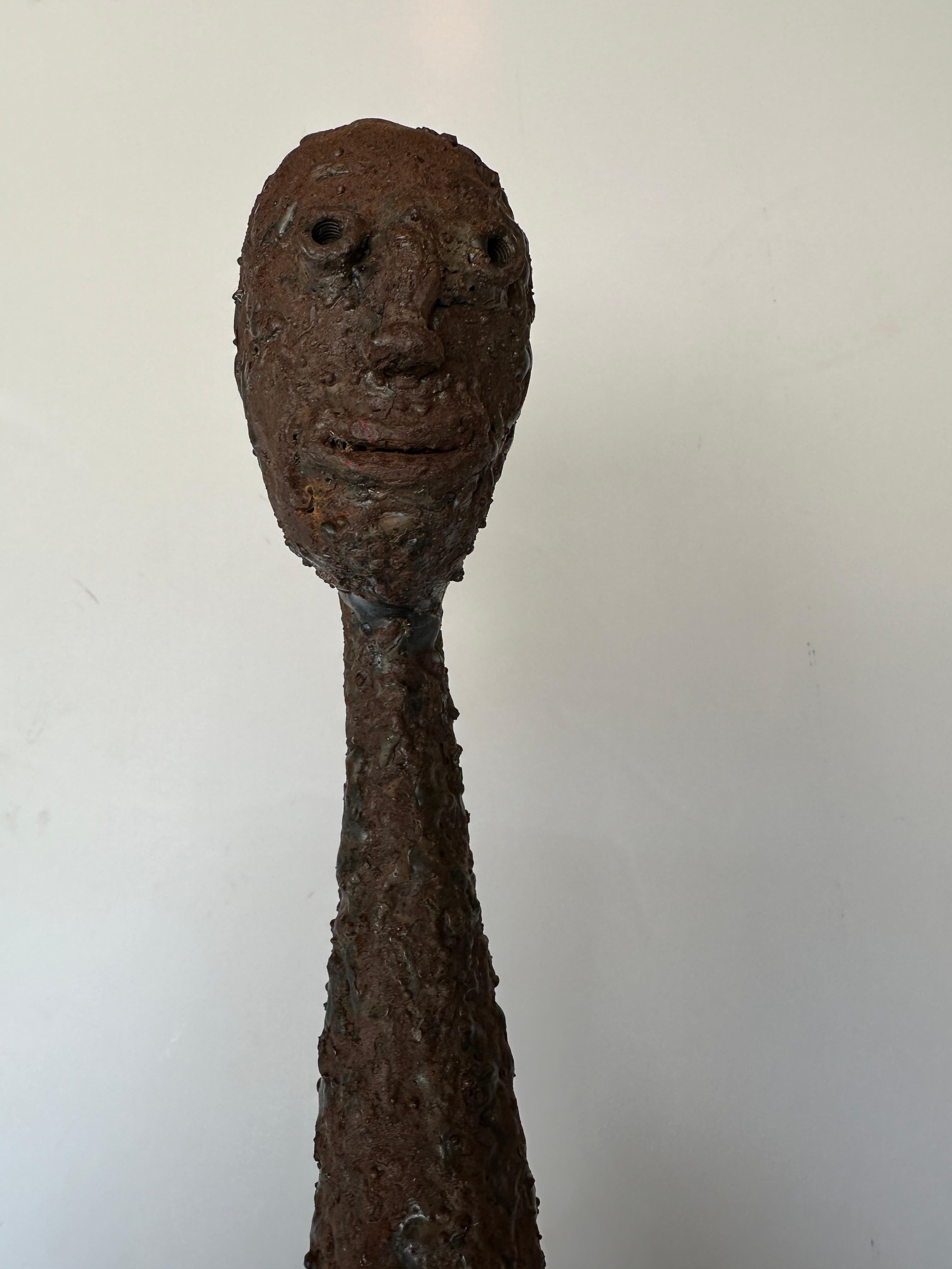 Modern Tall Life Size Alien Iron Statue on a Round Concrete Base 1