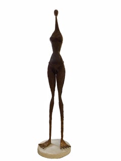 Modern Tall Life Size Alien Iron Statue on a Round Concrete Base