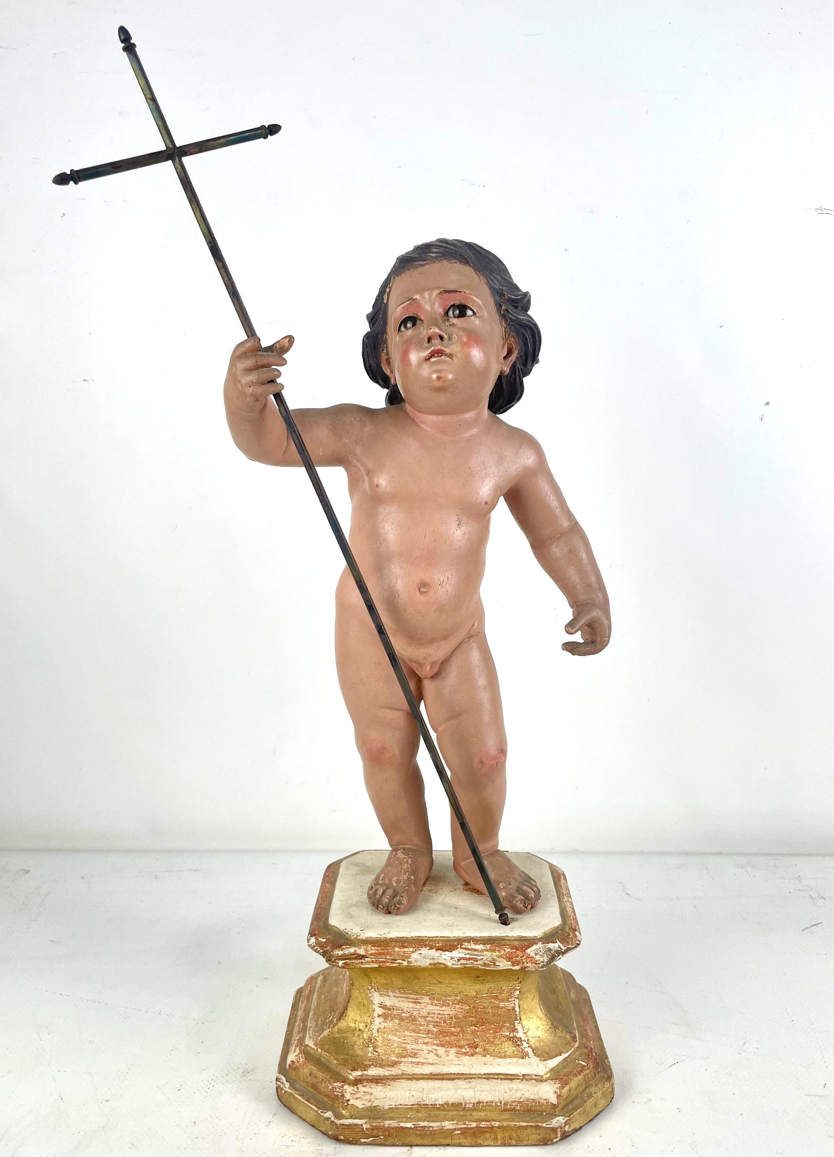Unknown Figurative Sculpture - Talla Antigua de San Juan Bautista Niño con Cruz de Plata  – Siglo XVIII/XIX