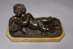 Tiffany & Co. Siglo XIX Querubín de bronce sobre base de mármol