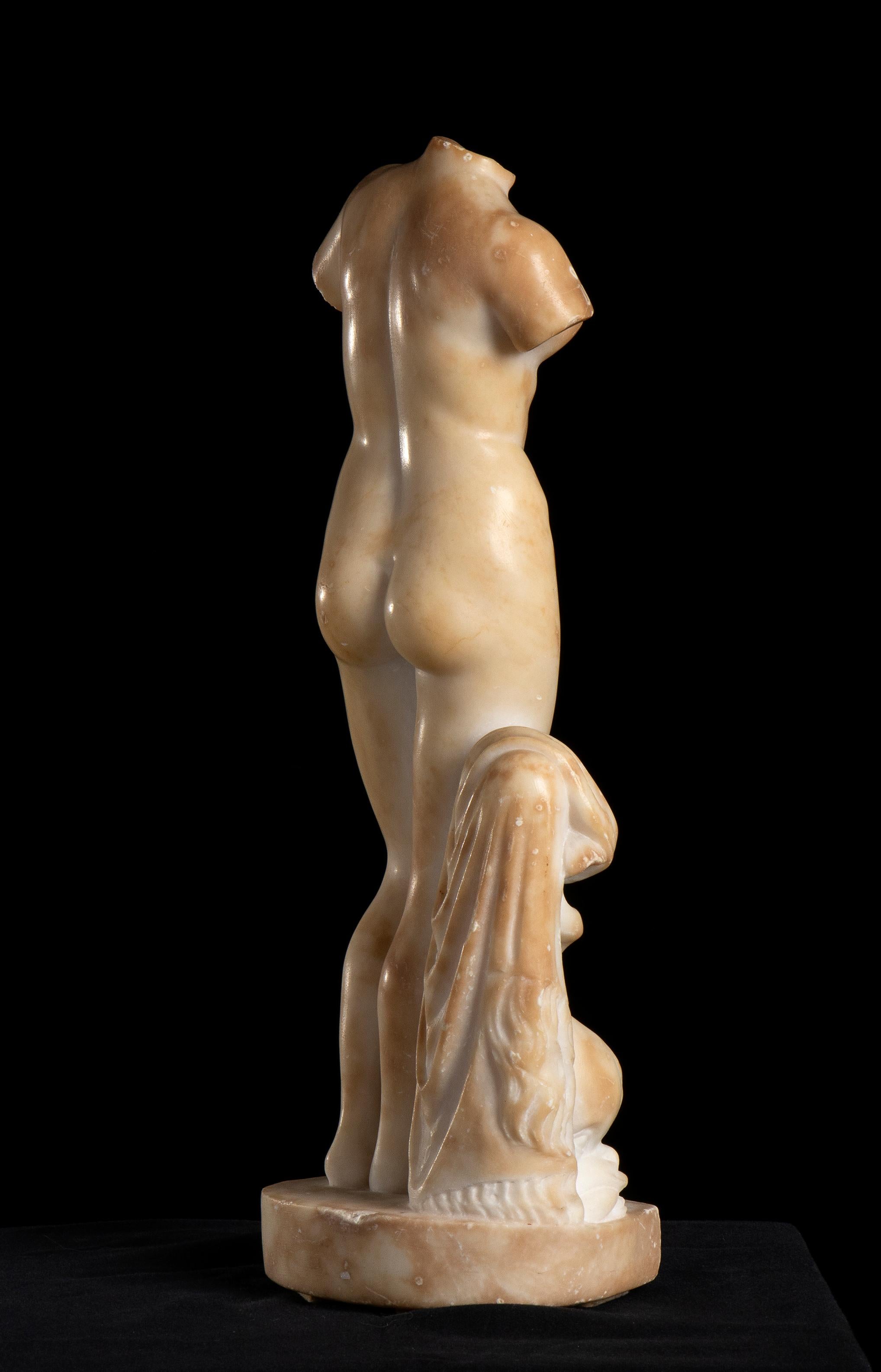 a very beautiful sculpture of Aphrodite , in a natural white marble alabaster of Tuscany central Italy. This piece made after the originals Hellenistic sculptures of Aphrodite and after the Roman vision of Venus represent a very classical vision of