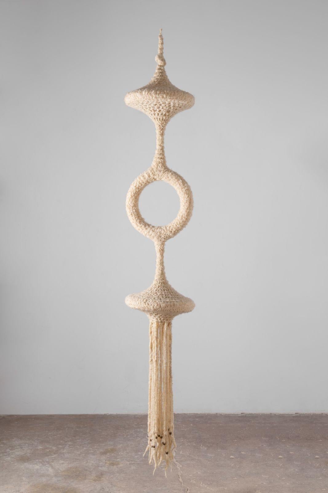 This is a collection of hand woven textile sculptures by fiber artist Barbara Coburn created in the 1970s and designed to be suspended from the ceiling. This listing is for all three examples we currently have available. They present very well as a