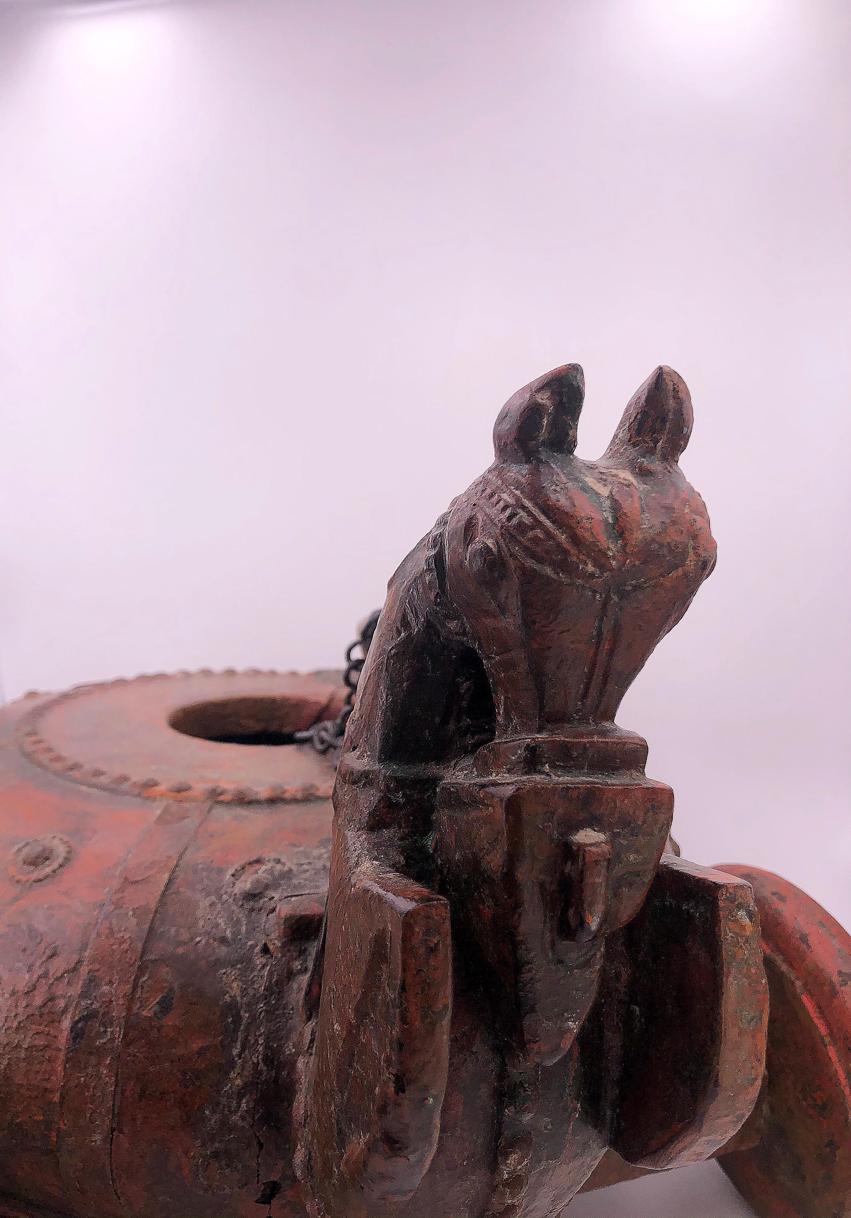 Asian vintage wood horse, with chain and opening in center. This piece shows signs of the years gone by and we feel the time worn feel adds more character. Period is an estimate, not signed or dated.
