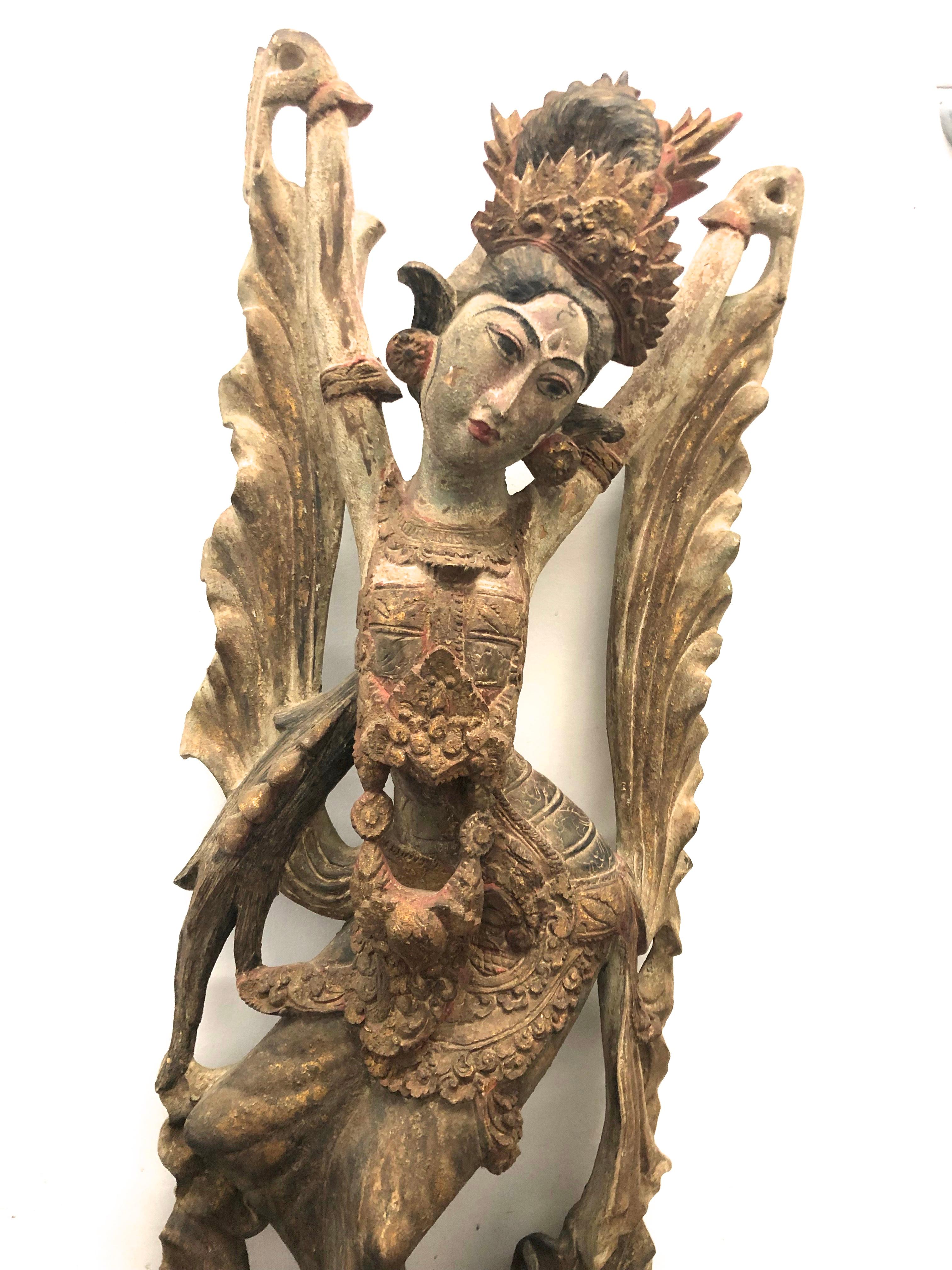 Large Wood Sculpture of a Dancer, Bali early 20th century.
Hand carved jackfruit wood sculpture of a Balinese traditional Legong Dancer.
41 inches tall 15 inches wide and 8 deep
