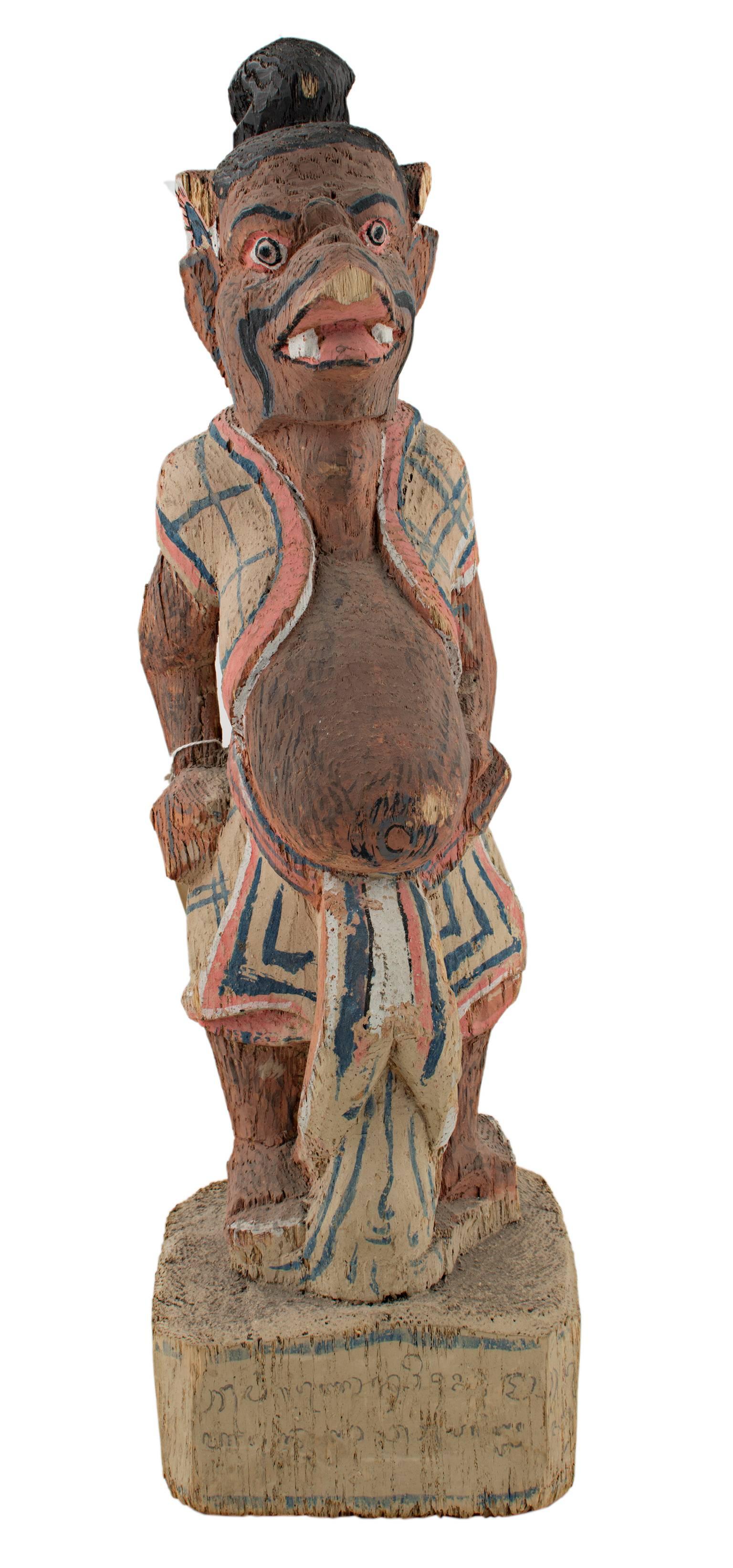Unknown Figurative Sculpture - "Wooden Figure, " Carved Wood created in Indonesia during the 19th Century 